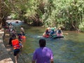 Tourists paddle whitewater river in Garden.