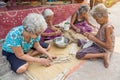 NAKHON PHANOM, THAILAND - Mar 25, 2019 : Group Senior Woman manually weaving bamboo