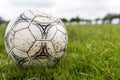 Nakhon Ratchasima, Thailand - October 1 : Muddy soccer ball on a football field in Municipal Stadium Nakhon Ratchasima on October Royalty Free Stock Photo