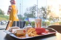 Nakhon Sawan, THAILAND - December 27, 2019: Mcdonald`s hamburger, French fried and coca cola on fast food tray in Mcdonald`s