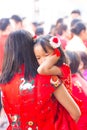 NAKHON SAWAN, THAILAND - FEBRUARY 8 : unidentified asian girl crying in her mother arm in Chinese New Year festival on February 8