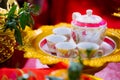 Nakhon Sawan Thailand-13 Jan 2022: Set of Chinese teapots placed on gold tray at wedding ceremony