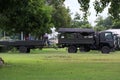 Nakhon Sawan, Thailand, 27 September 2021, Army trucks carrying boats for helping people in floods. parked on the lawn