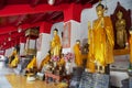 Gold covered Buddha statues at Wat Phra Mahathat Woramahawihan temple in Nakhon Sri Thammarat, Thailand.