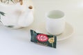 Nakhonchaisi, Nakhonpathom/Thailand - 8/13/2019: Japanese green tea flavored Kitkat with a set of teapot and tea cup