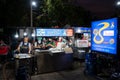 Nakorn Prathom, Thailand - April 4, 2023 : Local people walking in food truck night market in front of Phra Pathom Chedi the