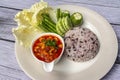 Nam phrik ong is a popular Thai food in Northern Thailand. Composition with rice, pork and fresh vegetables