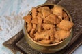 Namakpara Khurma, Nimki, Mathri which is a crispy, crunchy and savory strips in a bowl