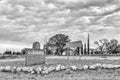 Name board and directional sign at entrance to Vosburg. Monochrome