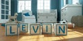 The name levin written with wooden toy cubes in children`s room