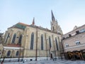 The Name of Mary Church, or Novi Sad catholic cathedral on a sunny afternoon from behind, on the Katolicka porta square. Royalty Free Stock Photo