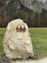 Name of National Park Berchtesgaden on the rock that located near St.Bartholomew`s Church at the shore of the Konigsee Lake in Ber