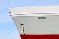 Name of passenger and vehicle ferry MV Coho on bow of boat in closeup