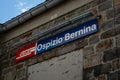 Name plate of RhB Ospizio Bernina railway station, Grisons, Switzerland Royalty Free Stock Photo