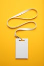 Name tag badge mockup, event identification on yellow background