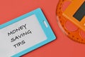 Name tag written with MONEY SAVING TIPS Royalty Free Stock Photo