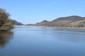 Namedy, Germany - 03 29 2021: Blue Rhine with wave breakers, DrachenzÃÂ¤hne