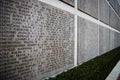 Names of Second world war casualties on a tribute wall in Florence, Italy