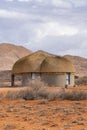 Thatched roof house at the Namib Naukluft National Park, vertical Royalty Free Stock Photo