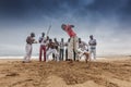 NAMIBE/ANGOLA - 28 AUG 2013 - African sportsmen practicing the famous Brazilian capoeira fight