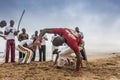 NAMIBE/ANGOLA - 28 AUG 2013 - African sportsmen practicing the famous Brazilian capoeira fight