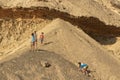 NAMIBE/ANGOLA 03NOV2018 - Boys playing on the canyon top in the Namibe Desert. Angola. Africa Royalty Free Stock Photo