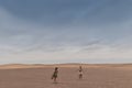 NAMIBE/ANGOLA - 03NOV2018 - girls walking in the desert of Namibe. Africa. Angola