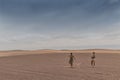 NAMIBE/ANGOLA - 03NOV2018 - girls walking in the desert of Namibe. Africa. Angola