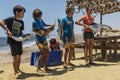 NAMIBE/ANGOLA - 03NOV2018 - Group of children just returned from a fishing morning with fish in hand Royalty Free Stock Photo