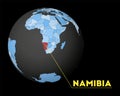 Namibia on dark globe with blue world map.