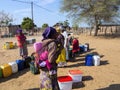 NAMIBIA, Kavango, OCTOBER 15: Women in the village waiting for water. Kavango was the region with the Highest poverty lev