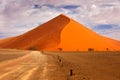 Namibia landscape. Big orange dune with blue sky and clouds, Sossusvlei, Namib desert, Namibia, Southern Africa. Red sand, biggest