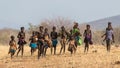 The joy of life and carefree children on the edge of a gravel road, Namibia. Royalty Free Stock Photo