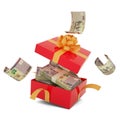 200 Namibian dollar notes inside an open red gift box. Namibian dollar inside and flying around a gift box Royalty Free Stock Photo