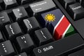 Namibian flag painted on computer keyboard. Online business, education, shopping in Namibia concept. 3D rendering