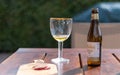 Namur, Belgium, 15 August 2020 image of belgian beer St.Feuillien on wooden table in the afternoon for refreshing in summer season