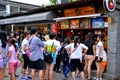 Nan luogu xiang lane in Beijing hutong front of one of the most popular snack bar filled with people Royalty Free Stock Photo