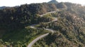 Nan, Thailand. Aerial view of Beautiful sky road over top of mountains with green jungle. Road trip on curve road in mountain. Royalty Free Stock Photo