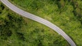 Nan, Thailand. Aerial view of Beautiful sky road over top of mountains with green jungle. Road trip on curve road in mountain. Royalty Free Stock Photo