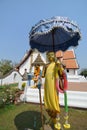 Statue of itinerant monk at Wat Phumin, Nan`s most famous Buddhist temple.