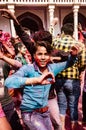 Young men dance during Holi Festival in India