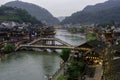 The Nanhua Bridge crosses the Tuo Jiang River in Fenghuang Ancient City in Tibet