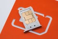 Nano sim card with sim tray and sim card adapter on white