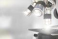 medical discovery concept, object 3D illustration - lab hi-tech scientific microscope with flare on soft focus background Royalty Free Stock Photo