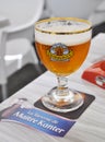 Glass of Grimbergen beer served at La Taverne de Maitre Kanter Royalty Free Stock Photo