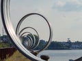 Nantes, France. Metal rings of the artist Daniel Buren along the river Loire