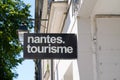 Nantes tourisme sign and logo text for French tourism office for ask help