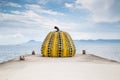 NAOSHIMA, JAPAN - Aug 13, 2018: Naoshima, Japan - August 13 2018: Yayoi Kusama\'s famous pumpkin artwork on Naoshima Island