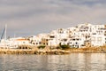 Naoussa coastal village Paros Island landscape view during golden hour with typical whitewashed cycladic houses, Greece Royalty Free Stock Photo