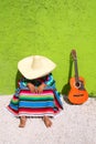 Nap lazy typical mexican sombrero man sitting Royalty Free Stock Photo